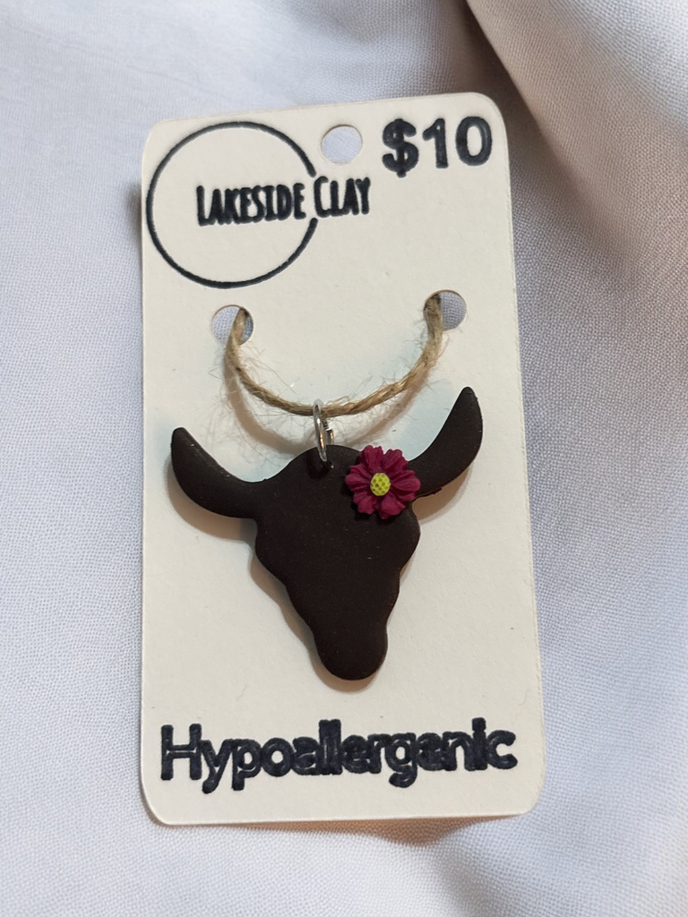 Steer with Magenta Flower Pendant